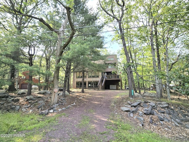 6128 Wales Ct, East Stroudsburg, PA 18301 - view of front of home featuring stairway and a deck