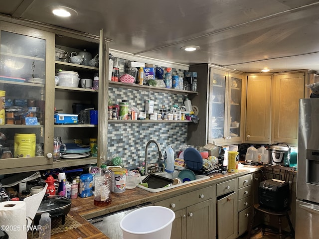 kitchen with open shelves, a sink, glass insert cabinets, and stainless steel fridge with ice dispenser