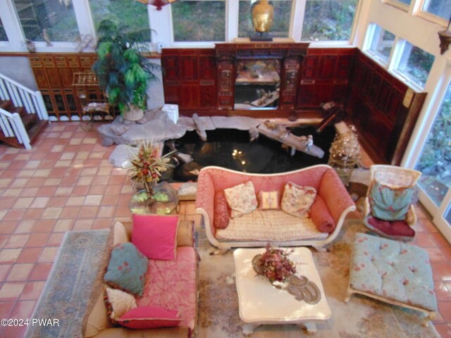 living room with tile patterned floors