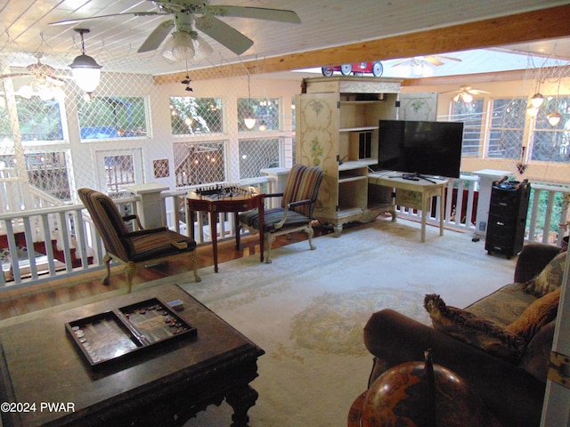 living room with beamed ceiling