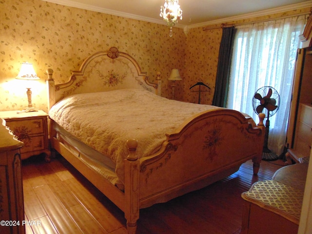 bedroom featuring crown molding and wood-type flooring