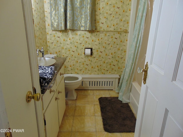 full bathroom with vanity, shower / bath combo, radiator, tile patterned flooring, and toilet