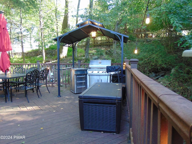 wooden terrace with grilling area