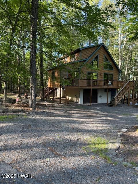 1030 Evergreen Dr, Lake Ariel, PA 18436 - view of front of property featuring stairs, a deck, and driveway