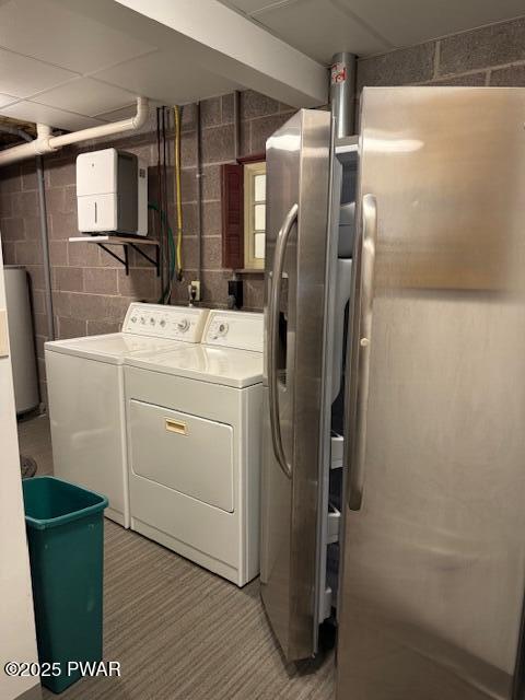 1030 Evergreen Dr, Lake Ariel, PA 18436 - laundry room featuring washing machine and dryer and concrete block wall