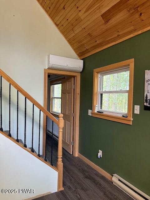 1030 Evergreen Dr, Lake Ariel, PA 18436 - staircase featuring baseboard heating, wood ceiling, lofted ceiling, wood finished floors, and healthy amount of natural light