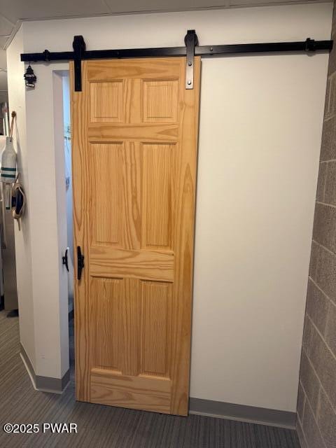 1030 Evergreen Dr, Lake Ariel, PA 18436 - detailed view of a barn door and baseboards