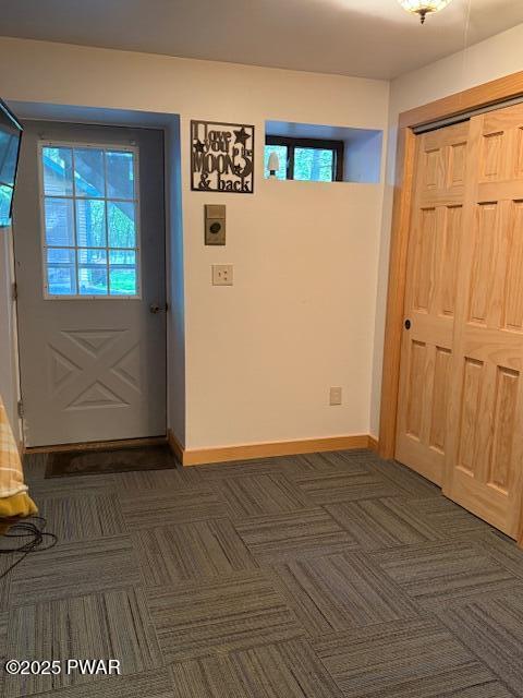 1030 Evergreen Dr, Lake Ariel, PA 18436 - foyer featuring baseboards and dark carpet