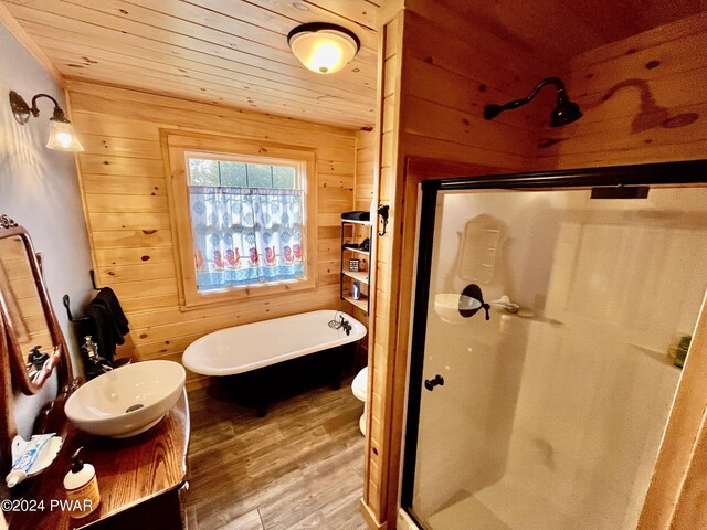 full bathroom featuring wooden walls, hardwood / wood-style floors, and wooden ceiling