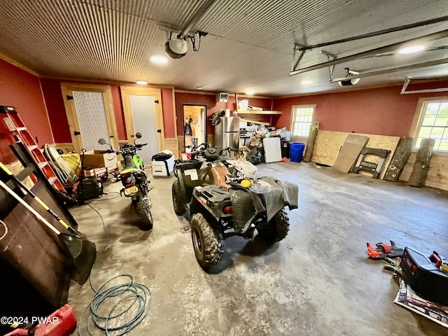 garage featuring a garage door opener