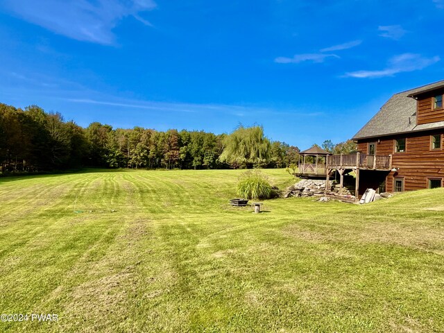 view of yard featuring a deck