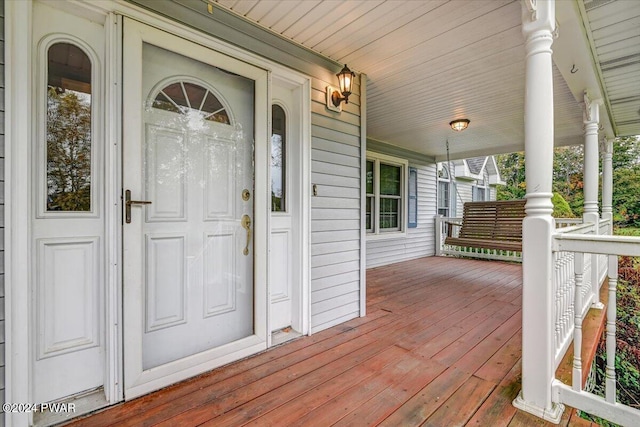 wooden deck featuring a porch