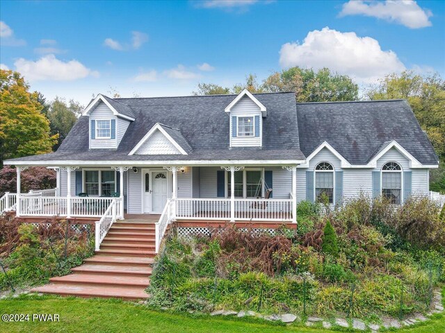 cape cod house with covered porch