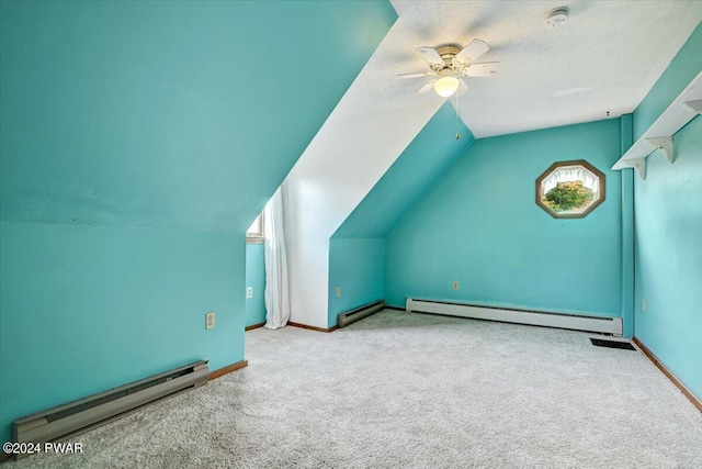 bonus room featuring baseboard heating, ceiling fan, and lofted ceiling