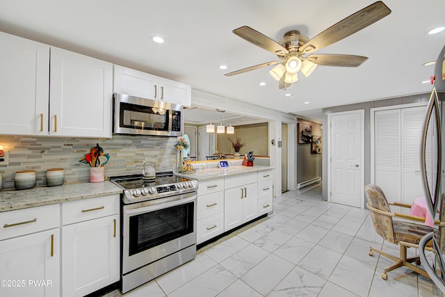 202 Fox Rd, Dingmans Ferry, PA 18328 - kitchen featuring stainless steel appliances, light marble finish floors, ceiling fan, recessed lighting, and white cabinets