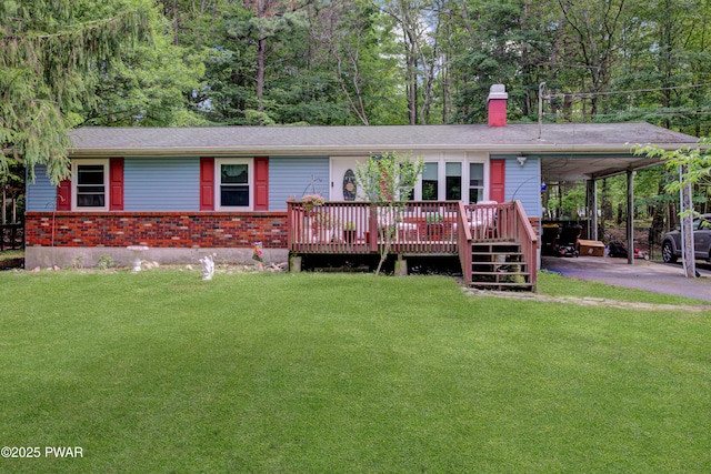 202 Fox Rd, Dingmans Ferry, PA 18328 - ranch-style home with asphalt driveway, a carport, a deck, and a front yard