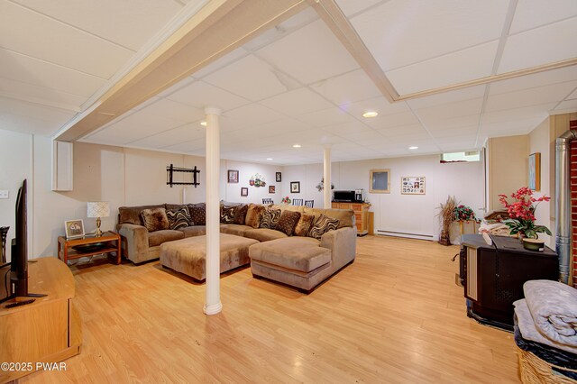 202 Fox Rd, Dingmans Ferry, PA 18328 - living room with light wood-style flooring, recessed lighting, a paneled ceiling, and a baseboard radiator