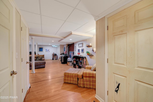 202 Fox Rd, Dingmans Ferry, PA 18328 - living room with light wood-style flooring and a paneled ceiling