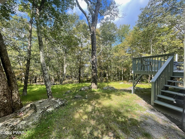 view of yard with a deck