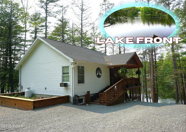 132 N Lake Shore Dr, Dingmans Ferry, PA 18328 - view of front of house with a shingled roof