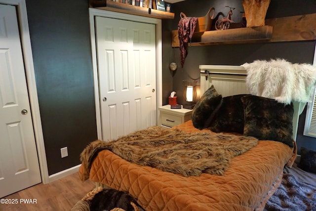 132 N Lake Shore Dr, Dingmans Ferry, PA 18328 - bedroom featuring wood finished floors and baseboards