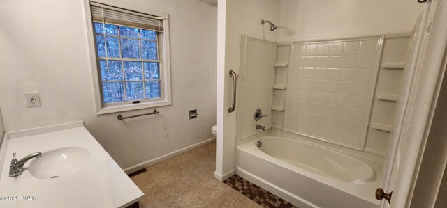 full bathroom featuring vanity, shower / bathtub combination, and toilet