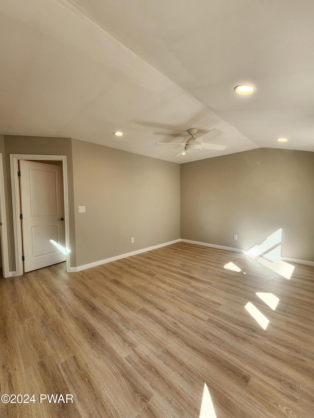 213 Butternut St, Dingmans Ferry, PA 18328 - unfurnished room featuring ceiling fan, vaulted ceiling, and light wood-type flooring