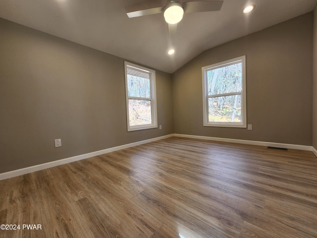 213 Butternut St, Dingmans Ferry, PA 18328 - spare room featuring hardwood / wood-style floors, ceiling fan, and vaulted ceiling
