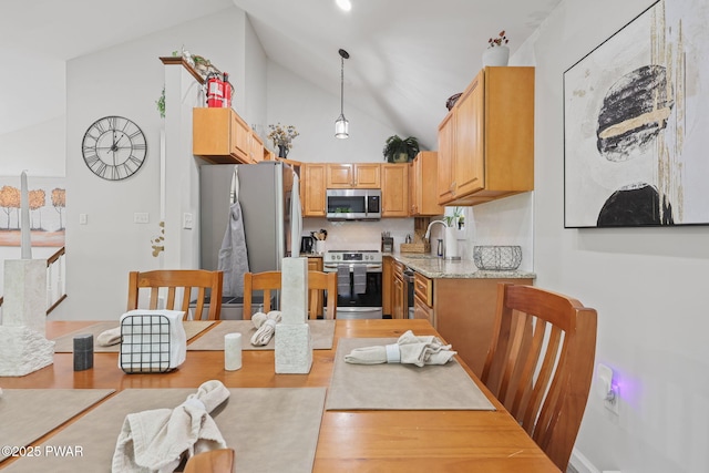 9326 Fairmount Way, Tobyhanna, PA 18466 - kitchen featuring stainless steel appliances, high vaulted ceiling, pendant lighting, wood finished floors, and a sink