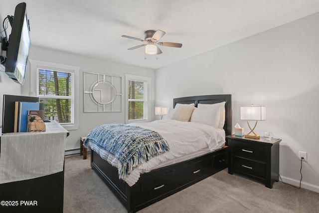 9326 Fairmount Way, Tobyhanna, PA 18466 - bedroom with multiple windows, light colored carpet, baseboards, and ceiling fan