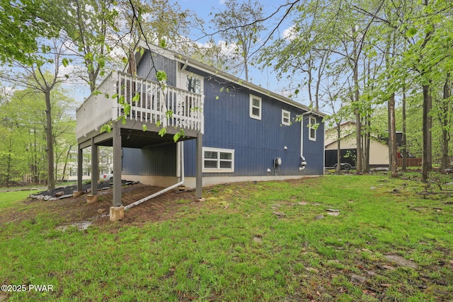 9326 Fairmount Way, Tobyhanna, PA 18466 - rear view of property featuring a deck and a lawn