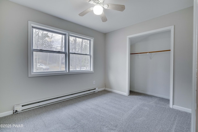 unfurnished bedroom with ceiling fan, a closet, carpet floors, and a baseboard radiator