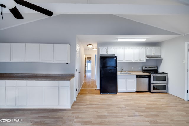 kitchen with white cabinetry, sink, lofted ceiling with beams, light hardwood / wood-style floors, and appliances with stainless steel finishes