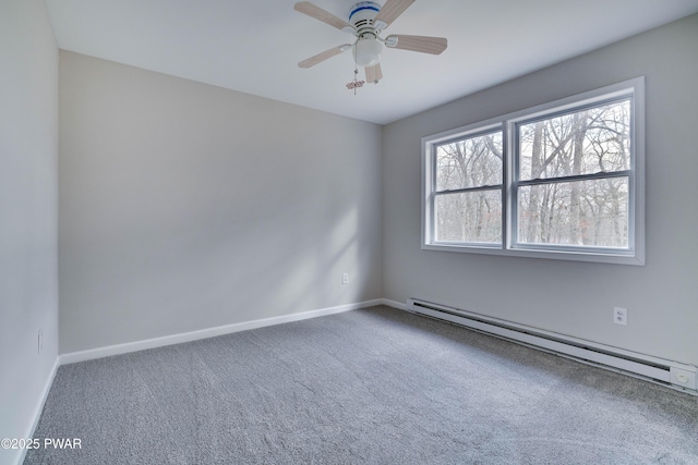 empty room with carpet flooring, ceiling fan, and a baseboard radiator