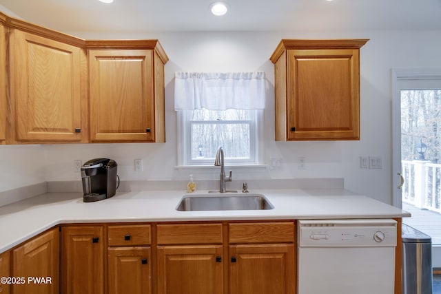 kitchen featuring sink and white dishwasher