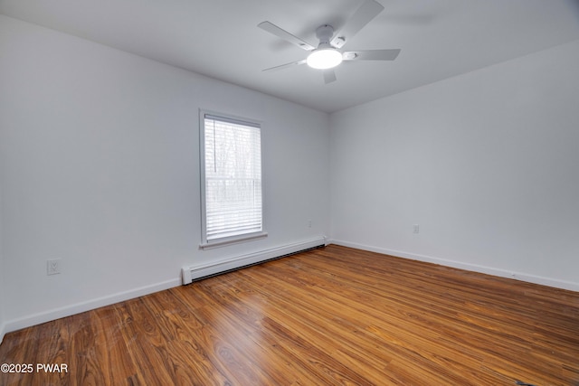 empty room with wood-type flooring, a baseboard heating unit, and ceiling fan