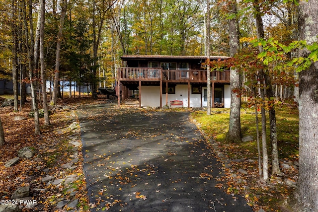 view of front of home with a wooden deck