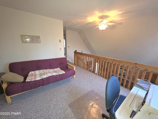 office area featuring carpet floors, ceiling fan, and lofted ceiling