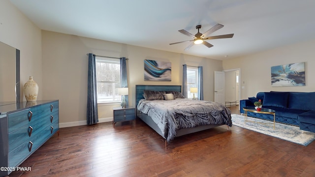 bedroom featuring dark hardwood / wood-style floors and ceiling fan