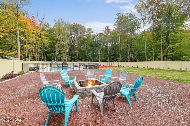 view of patio / terrace featuring a fire pit