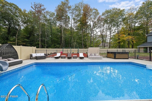 view of swimming pool featuring an outdoor hangout area and a patio area