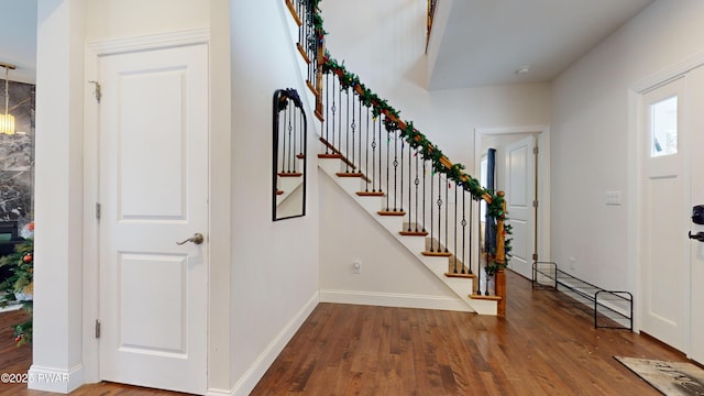 foyer with dark wood-type flooring