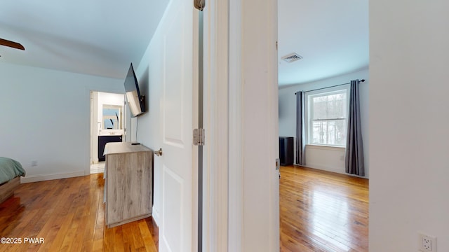 hallway featuring light wood-type flooring