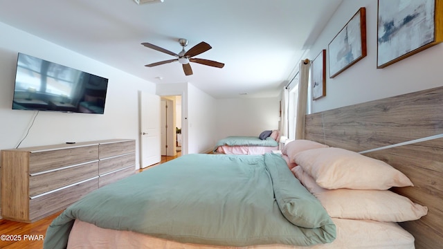 bedroom featuring ceiling fan and light wood-type flooring