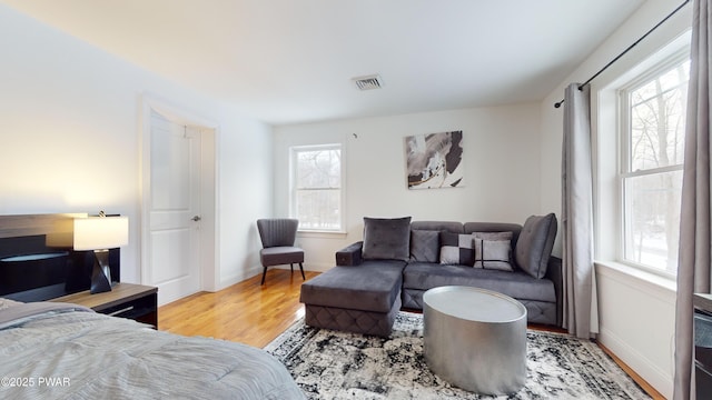 bedroom with light wood-type flooring