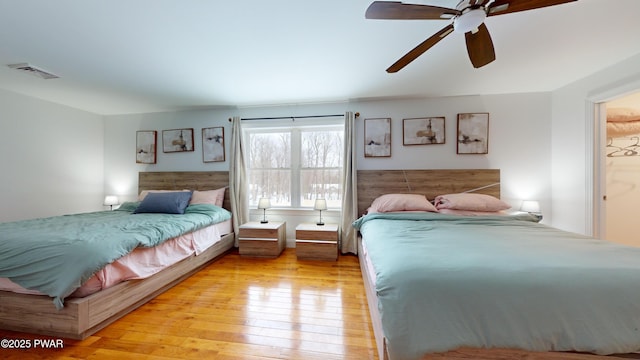 bedroom featuring ceiling fan and light wood-type flooring