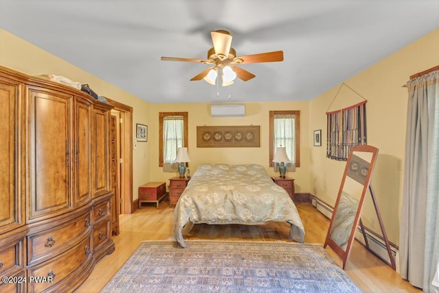 517 Sherman Rd, Susquehanna, PA 18847 - bedroom featuring an AC wall unit, multiple windows, and a baseboard radiator
