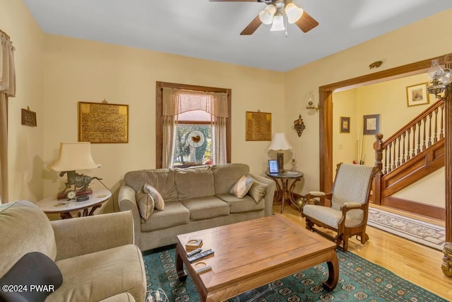 517 Sherman Rd, Susquehanna, PA 18847 - living room featuring stairs, a ceiling fan, and wood finished floors