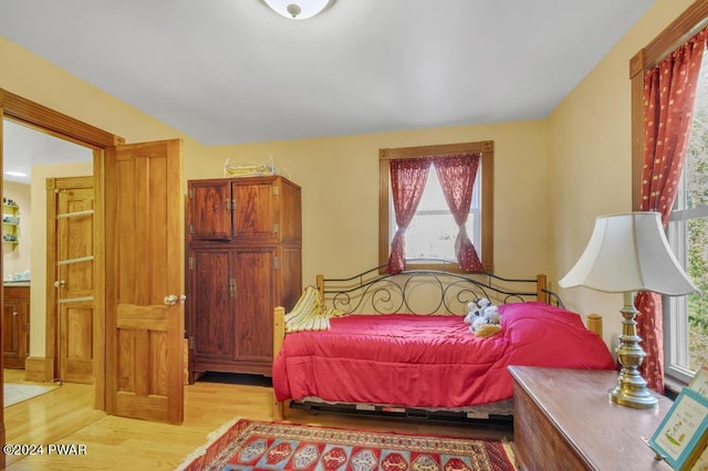 517 Sherman Rd, Susquehanna, PA 18847 - bedroom with multiple windows and light wood-type flooring