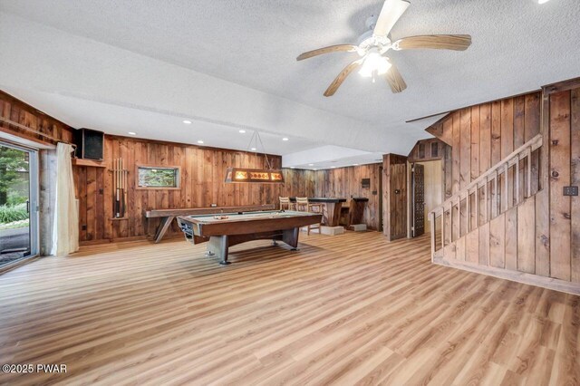 518 Lakeview Dr E, Lake Ariel, PA 18436 - playroom featuring wood walls, light wood-type flooring, billiards table, a textured ceiling, and ceiling fan